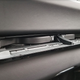 Illustration for article titled The Needlessly Complicated Cupholders in the Porsche 911 Are Awesome